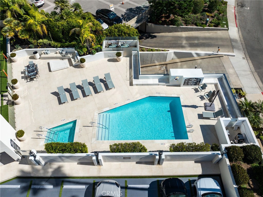 Private community pool deck - 601 Lido Park, Newport Beach CA 92663 - photo 25