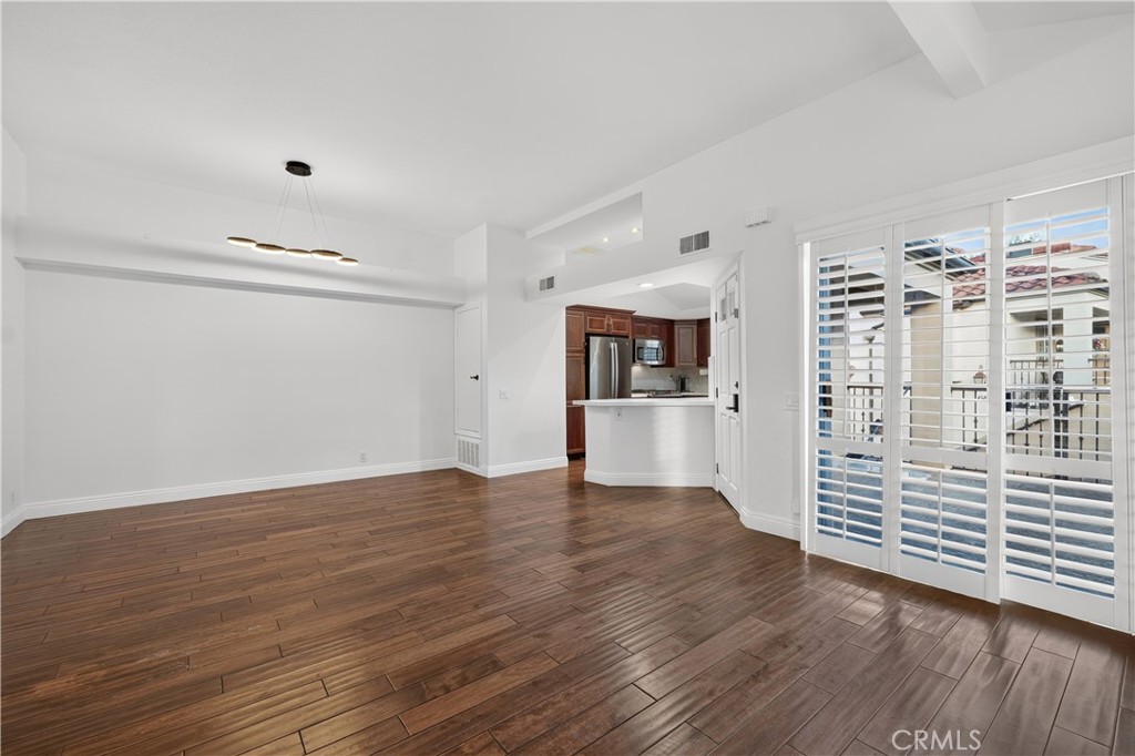 Dinning room and living room with sliding glass door to go out to the Patio - 88 Corsica Drive, Newport Beach CA 92660 - photo 7