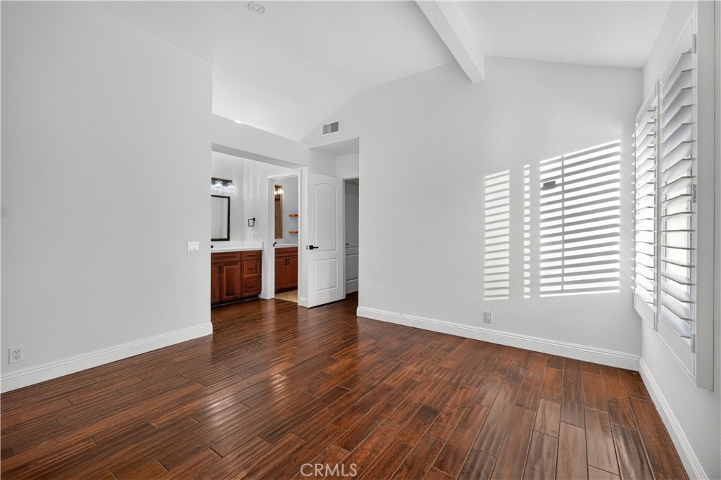 Primary bedroom with sink and and walk in closet - 88 Corsica Drive, Newport Beach CA 92660 - photo 14