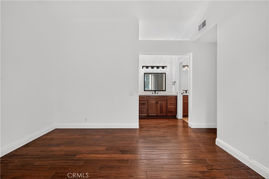 Primary bedrrom and sink and walk-in closet - 88 Corsica Drive, Newport Beach CA 92660 - photo 22