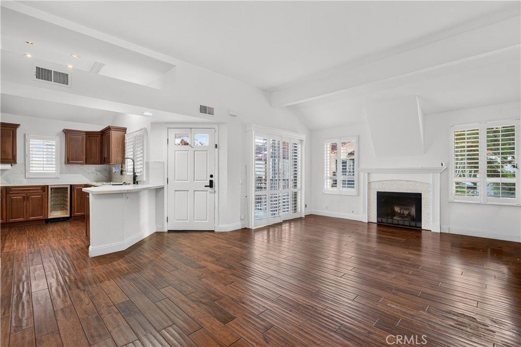 Fireplace in Living room and slider to patio - 88 Corsica Drive, Newport Beach CA 92660 - photo 6