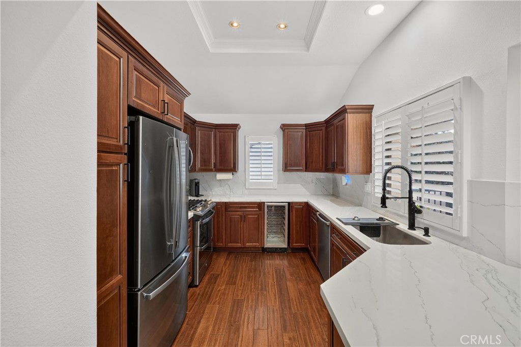 All New Corian counter tops and sink, faucet wine frige and range oven is gas all new. - 88 Corsica Drive, Newport Beach CA 92660 - photo 20