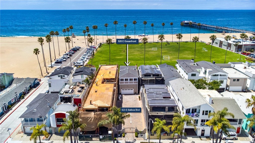920 E Oceanfront is now being offered separately from the adjacent lot at 923 E Balboa Blvd. 923 E Balboa (current drive - 920 E Oceanfront, Newport Beach CA 92661 - photo 4