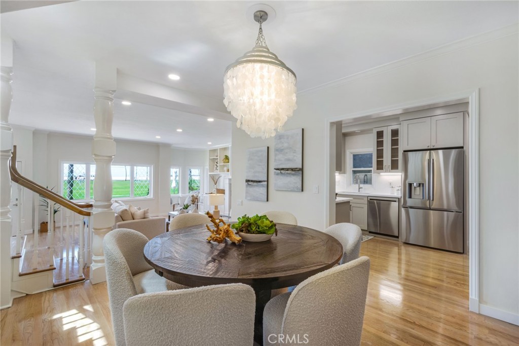 Elevated dining room, open to the kitchen and living room - 920 E Oceanfront, Newport Beach CA 92661 - photo 9