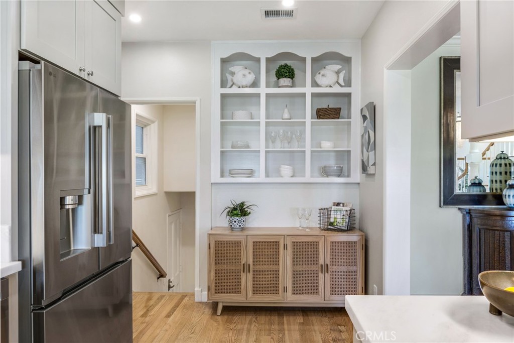 Rear stairs lead to main level bath and garage - 920 E Oceanfront, Newport Beach CA 92661 - photo 12