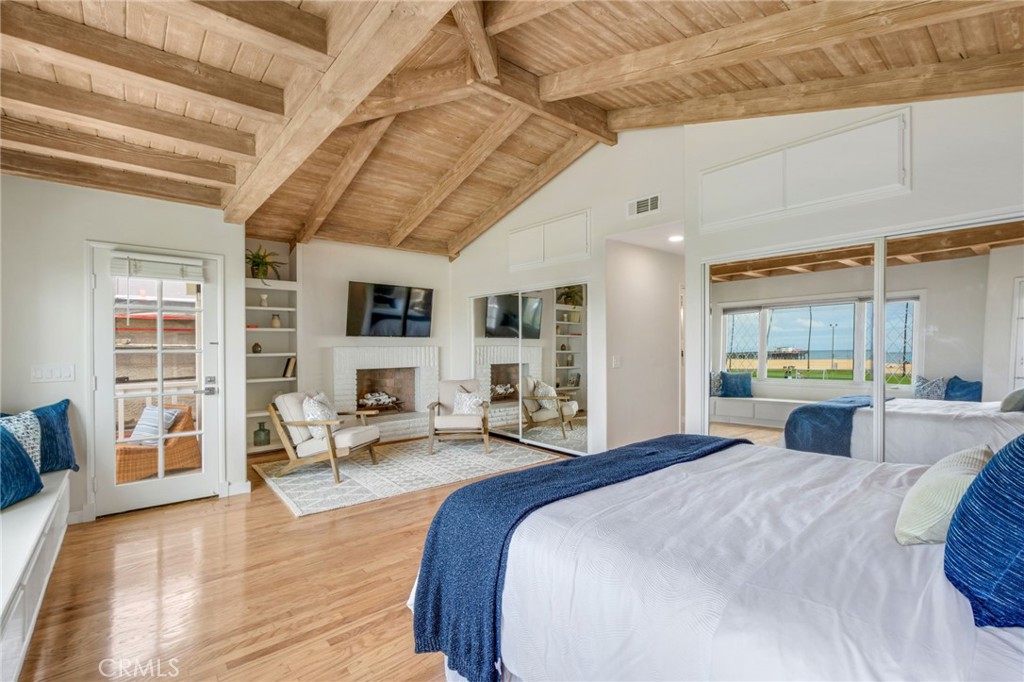 Take in the sights from the corner balcony from the primary bedroom - 920 E Oceanfront, Newport Beach CA 92661 - photo 16