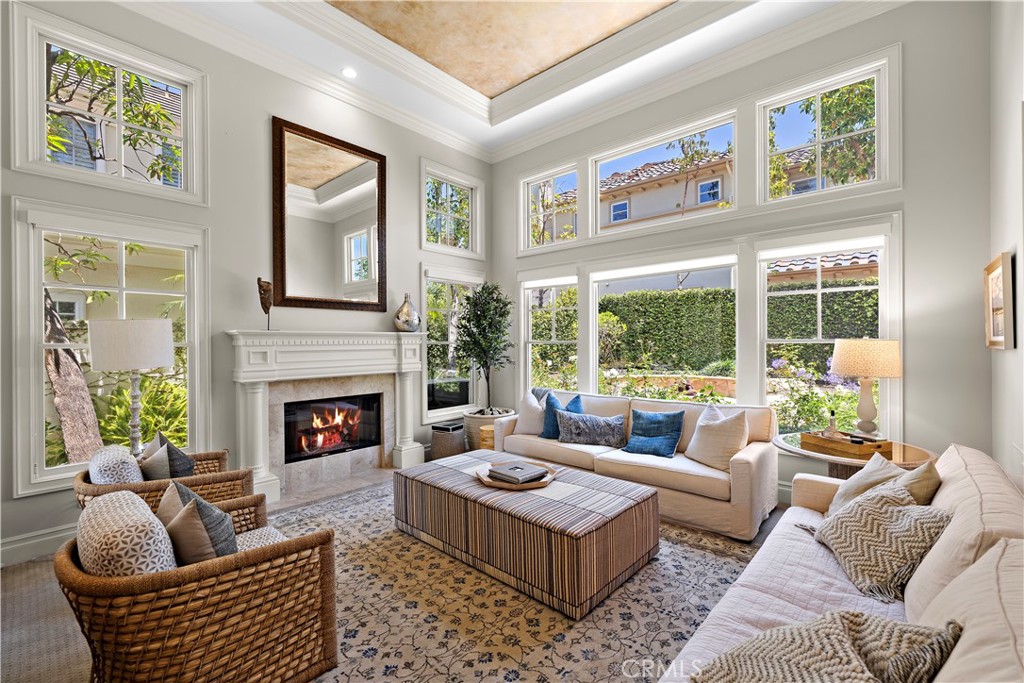 Living room with wood burning fireplace - 96 Old Course, Newport Beach CA 92660 - photo 2