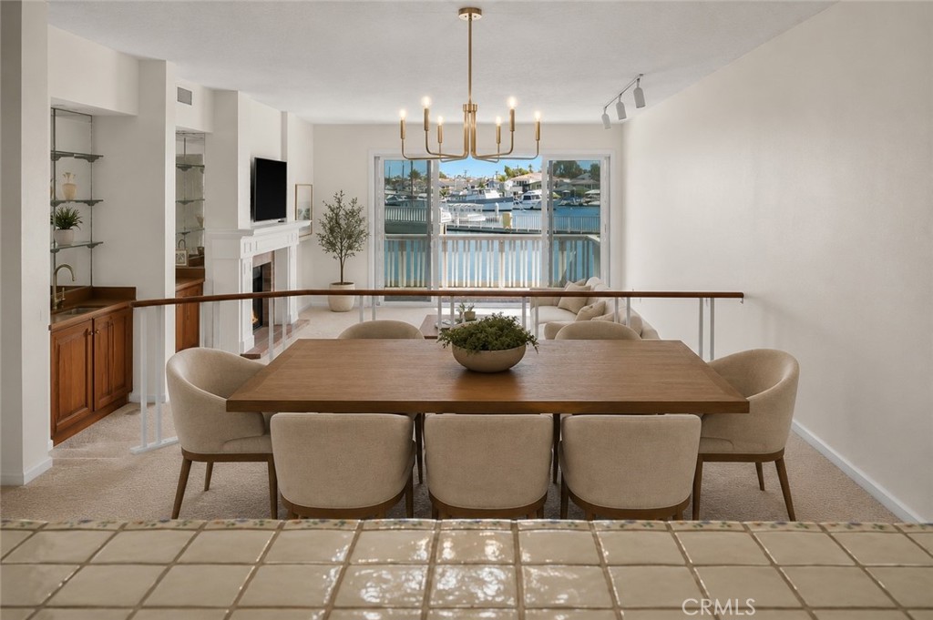 Image digitally enhanced to show furniture possibilities - 981 Bayside Cove 405, Newport Beach CA 92660 - photo 14