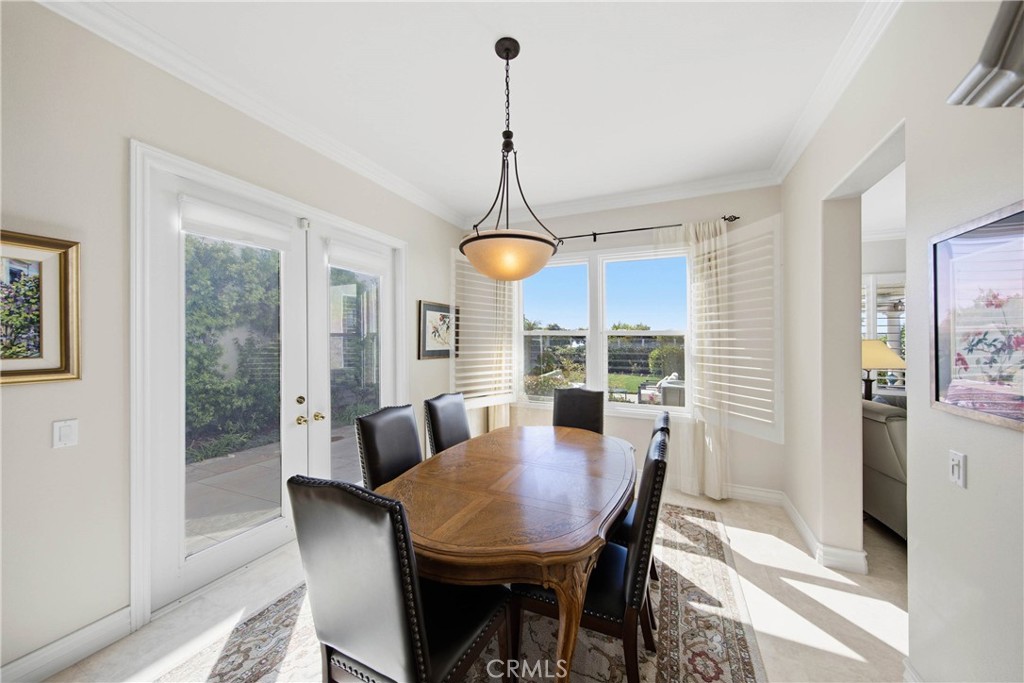 Formal Dining with double french door access to Side yard - 21 Pavona, Newport Coast CA 92657 - photo 15