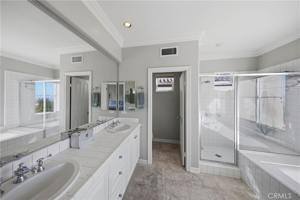 Master Bath- Twin Vantities and walkin shower with Separate Tub - 21 Pavona, Newport Coast CA 92657 - photo 28