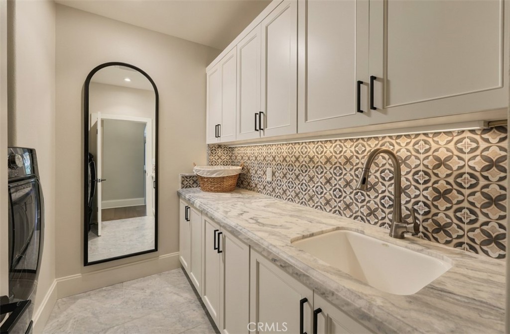 Main Level Laundry Room - 21 Shadowcast, Newport Coast CA 92657 - photo 35