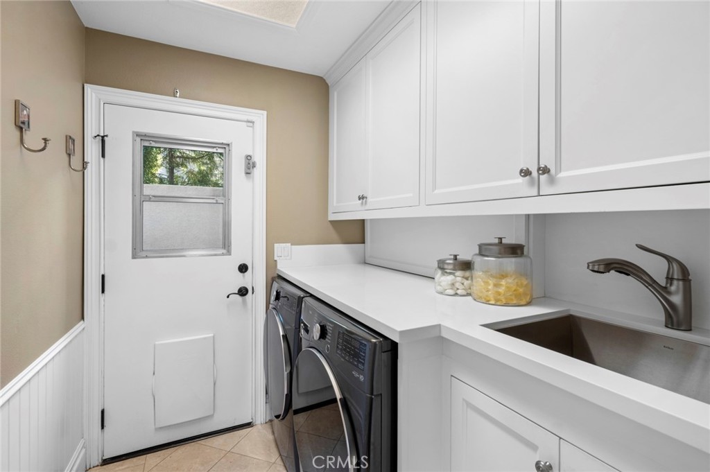 Laudry room with direct outdoor access. - 25 Lyon, Newport Coast CA 92657 - photo 33