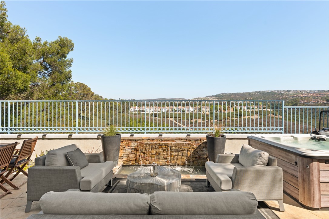 Backyard with canyon views, seating area, built in private BBQ and spa - 4 Chandon, Newport Coast CA 92657 - photo 3