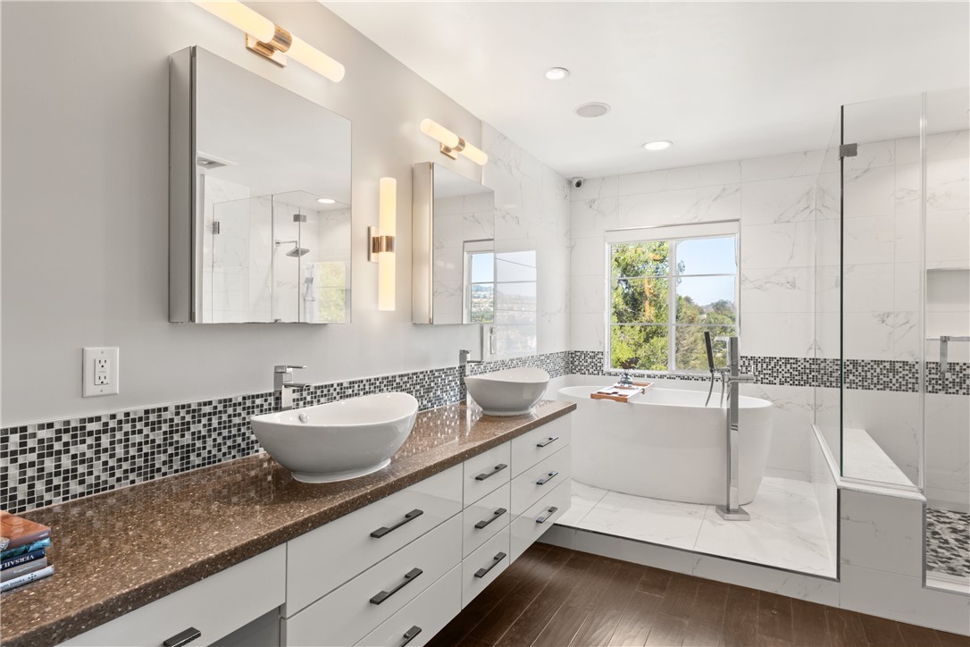 Primary Bathroom with soaking tub, shower and dual sinks - 4 Chandon, Newport Coast CA 92657 - photo 24