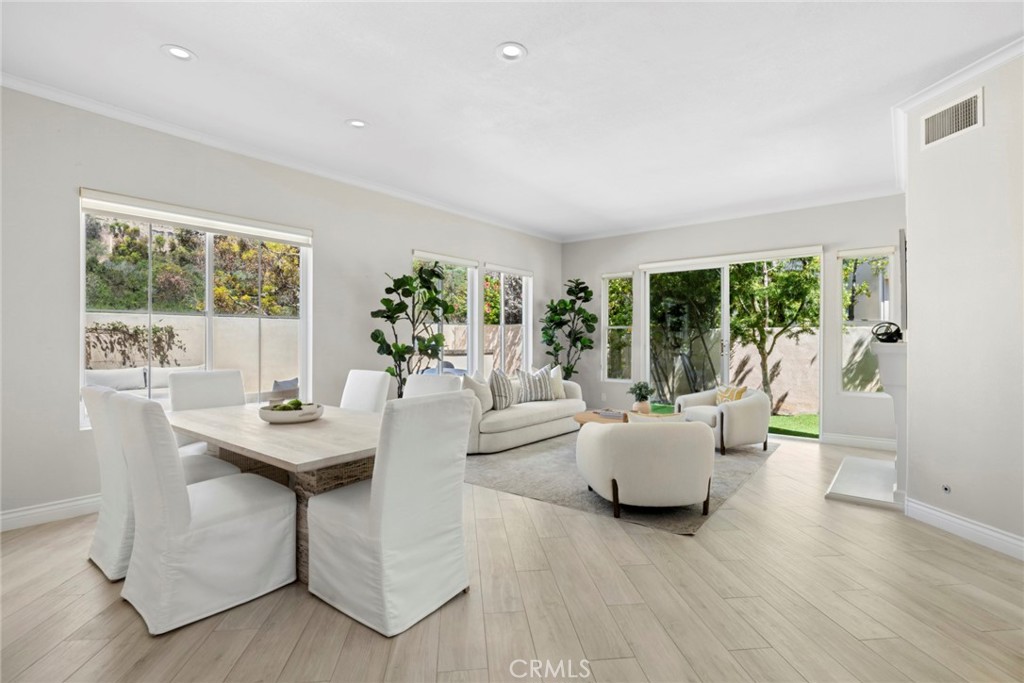 Formal dining a living room adjacent embrace intimate gatherings of any size. - 6 Tidal Surf, Newport Coast CA 92657 - photo 3