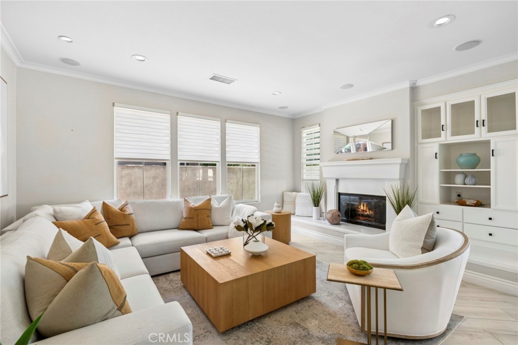 Light and bright living room w fireplace. All furniture available separately. - 6 Tidal Surf, Newport Coast CA 92657 - photo 11