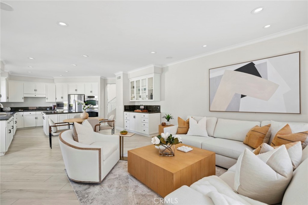 Open floor plan seamlessly blends into kitchen. - 6 Tidal Surf, Newport Coast CA 92657 - photo 12