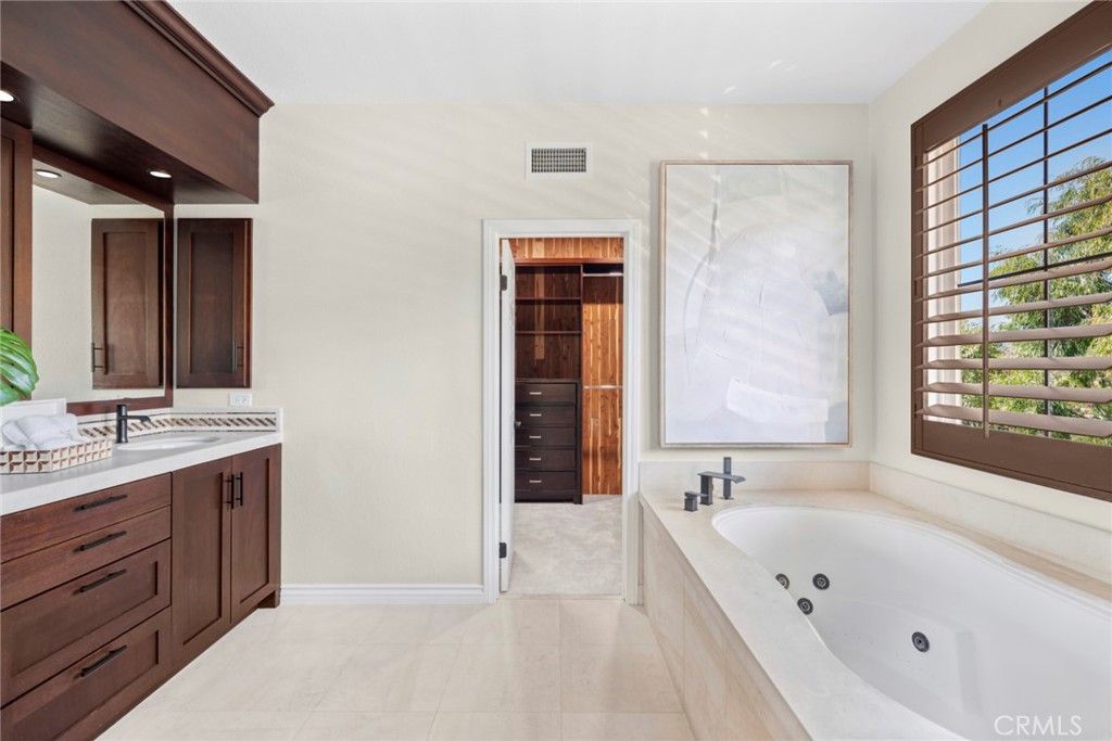 Spa-inspired primary bath with soaking tub and over-sized walk-in shower. - 6 Tidal Surf, Newport Coast CA 92657 - photo 17
