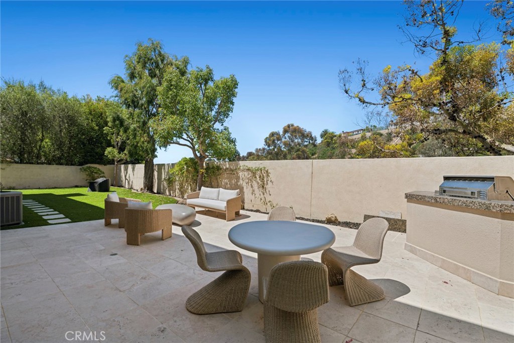 Multiple outdoor seating areas. - 6 Tidal Surf, Newport Coast CA 92657 - photo 27