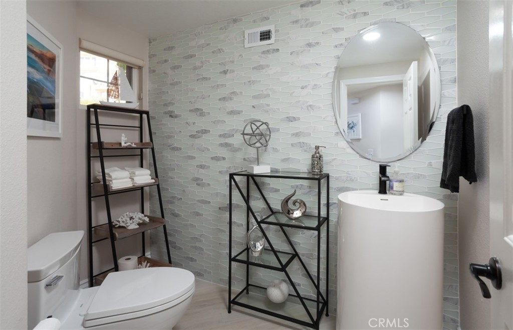 Updated powder room. - 6 Tidal Surf, Newport Coast CA 92657 - photo 35
