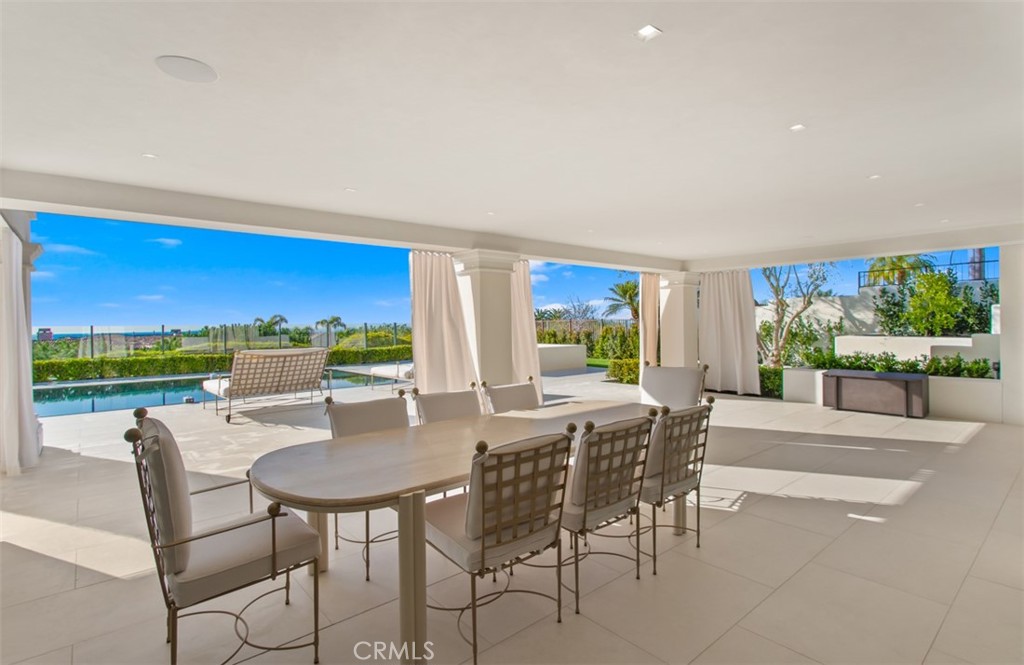 lower level covered dining area - 7 Sailview, Newport Coast CA 92657 - photo 70