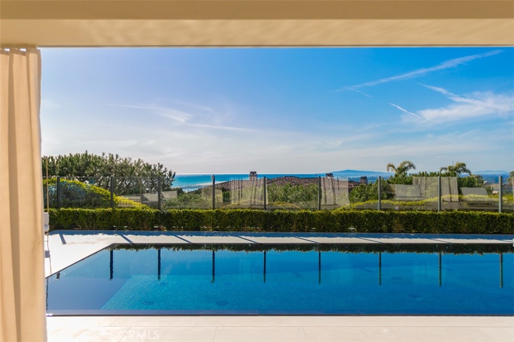 Lower level showing ocean​​‌​​​​‌​​‌‌​​‌‌​​‌‌​​‌​​​‌‌​‌​​​​‌‌​‌​​ views - 7 Sailview, Newport Coast CA 92657 - photo 72
