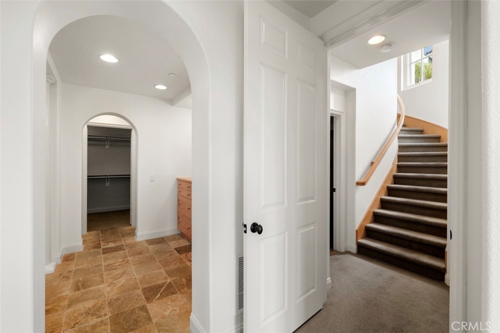 Lower Floor showcases Master/Primary, laundry, and access to oversized patio and large storage/flex space - 76 Sidra Cove, Newport Coast CA 92657 - photo 39