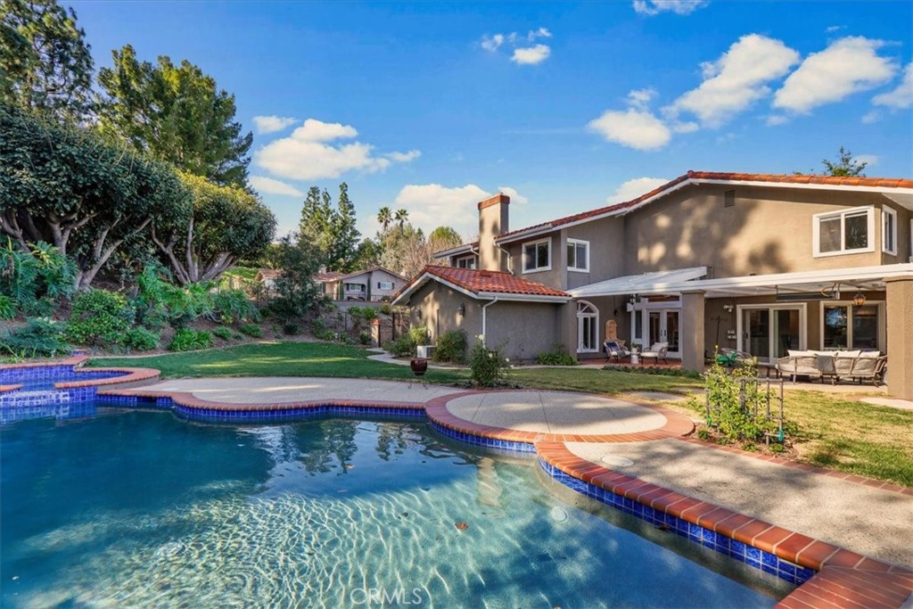 Custom pool and spa view of the home with 23,000+ sq ft lot - 10972 Furlong Drive, North Tustin CA 92705 - photo 1