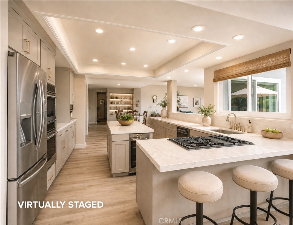An entertainer's kitchen. Digitally enhanced. - 1321 El Finito Way, North Tustin CA 92705 - photo 9