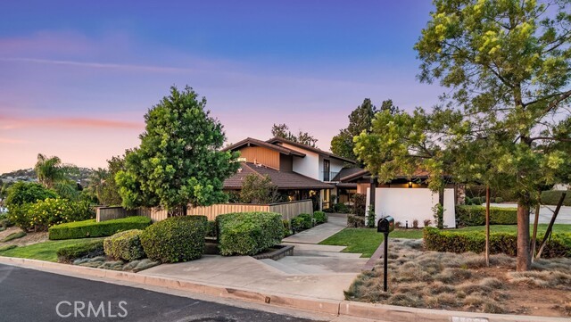 Enter this special property from the long walkway. - 1411 Faren Drive, North Tustin CA 92705 - photo 1