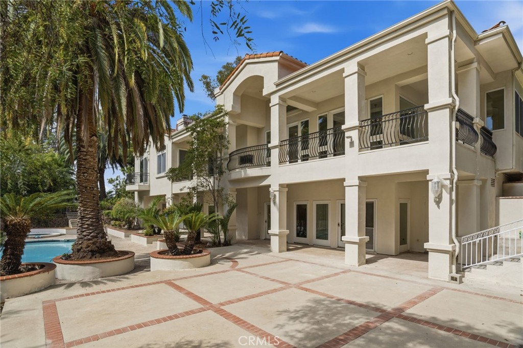 This extraordinary estate offers 5,000 square feet of luxurious living space on a half-acre lot. Expansive outdoor space - 1852 La Loma, North Tustin CA 92705 - photo 1
