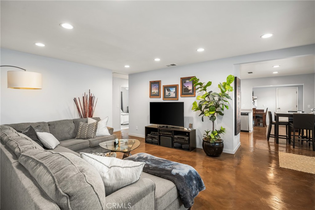 Large living room features polished concrete floors. - 19301 Maynard Way, North Tustin CA 92705 - photo 1