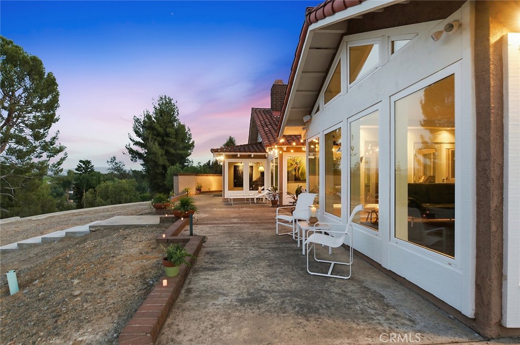 A wrap around patio surrounds the home - 10571 Morada, Orange CA 92869 - photo 7