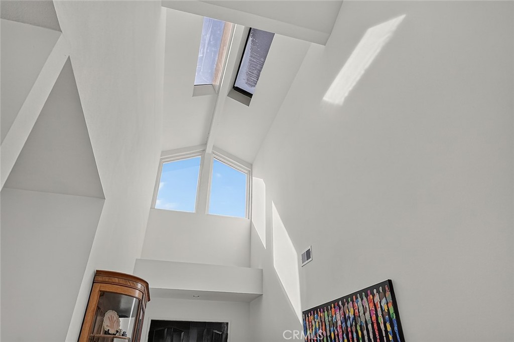Dramatic 2 story entry with high clerestory windows and skylights - 10571 Morada, Orange CA 92869 - photo 14