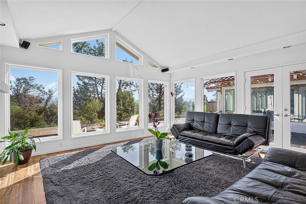 Walls of windows surround the family room - 10571 Morada, Orange CA 92869 - photo 15