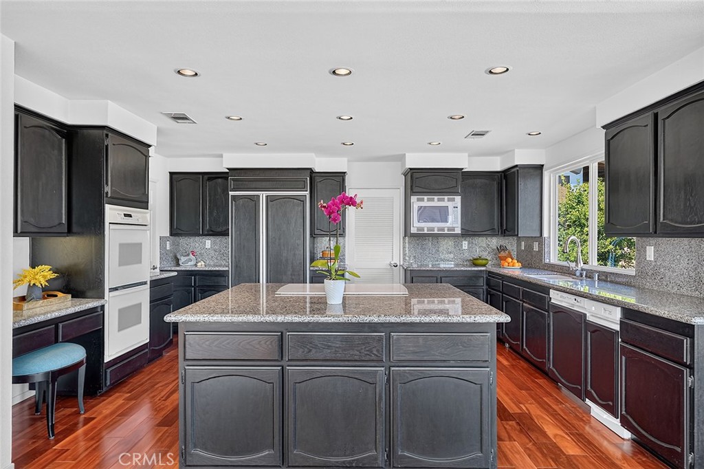 Electric appliances, recessed lighting, and stone counters - 10571 Morada, Orange CA 92869 - photo 24