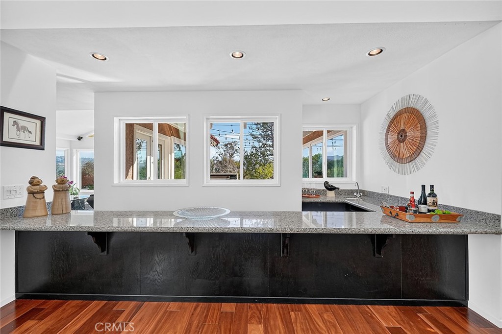 The long bar is directly across from the dining room - 10571 Morada, Orange CA 92869 - photo 29