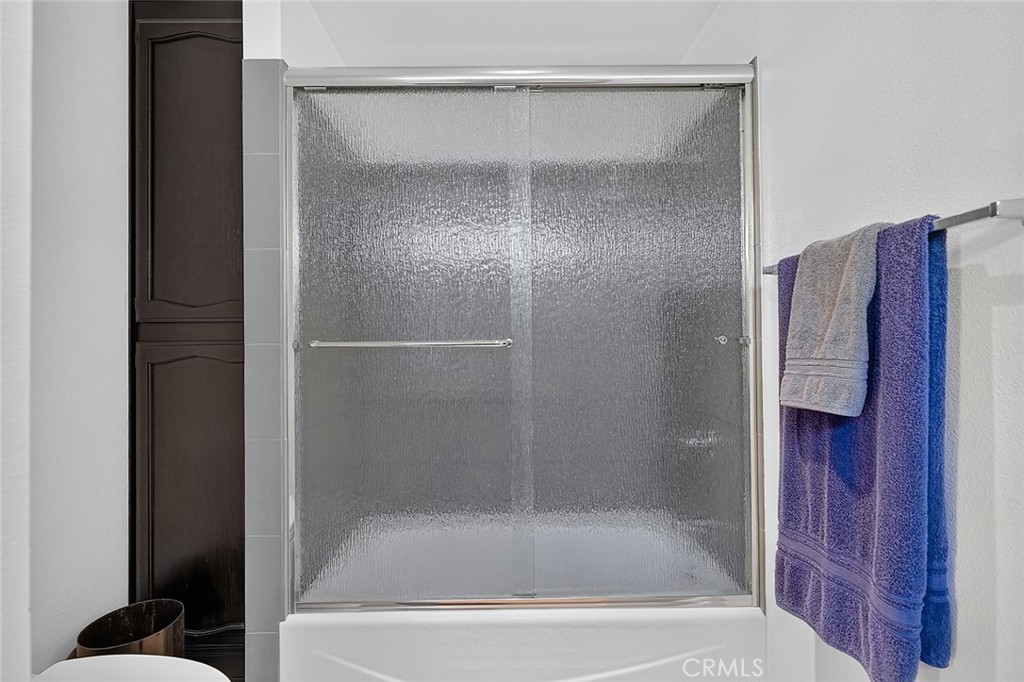 Shower over the tub in the second bath - 10571 Morada, Orange CA 92869 - photo 43