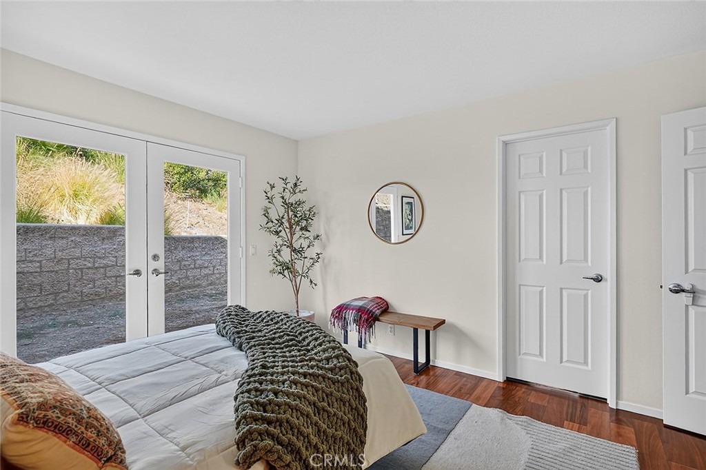 The third bedroom has French doors to the side patio - 10571 Morada, Orange CA 92869 - photo 47
