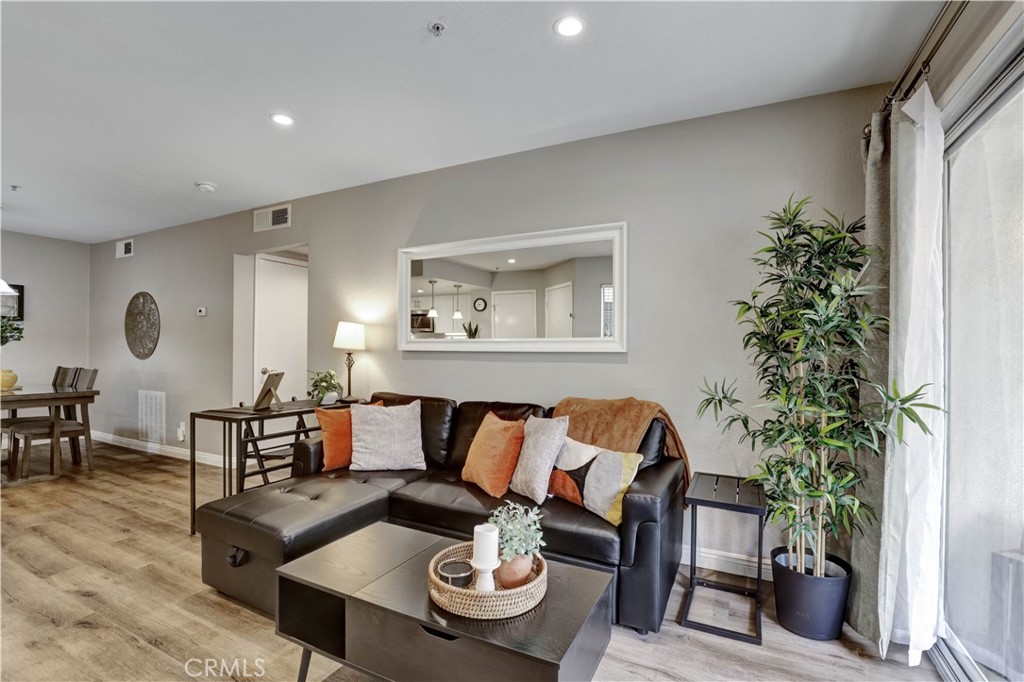 Living Room with Sectional Sofa, SmartTV and open floor plan - 129 N Cross Creek, Orange CA 92869 - photo 3