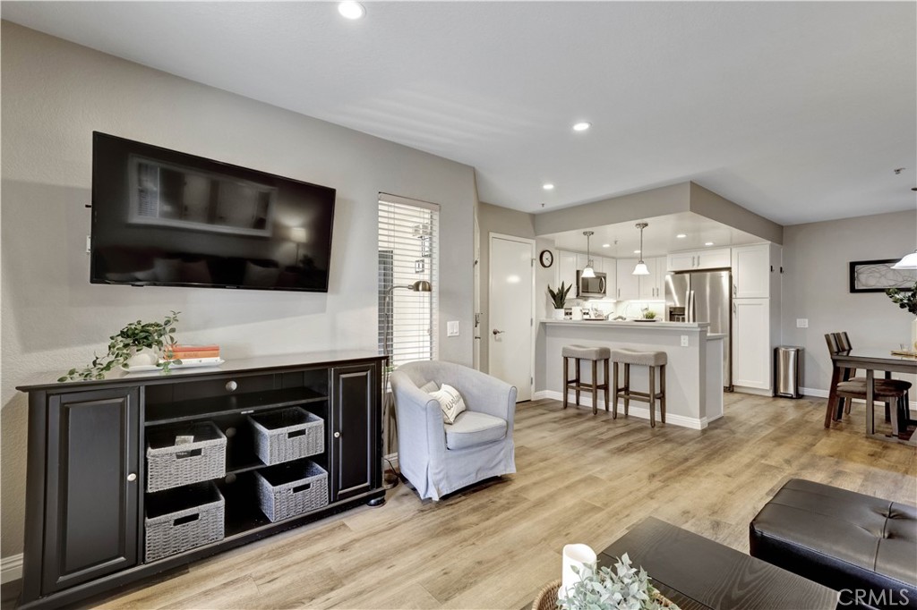 Living Room with Sectional Sofa, SmartTV and open floor plan - 129 N Cross Creek, Orange CA 92869 - photo 4