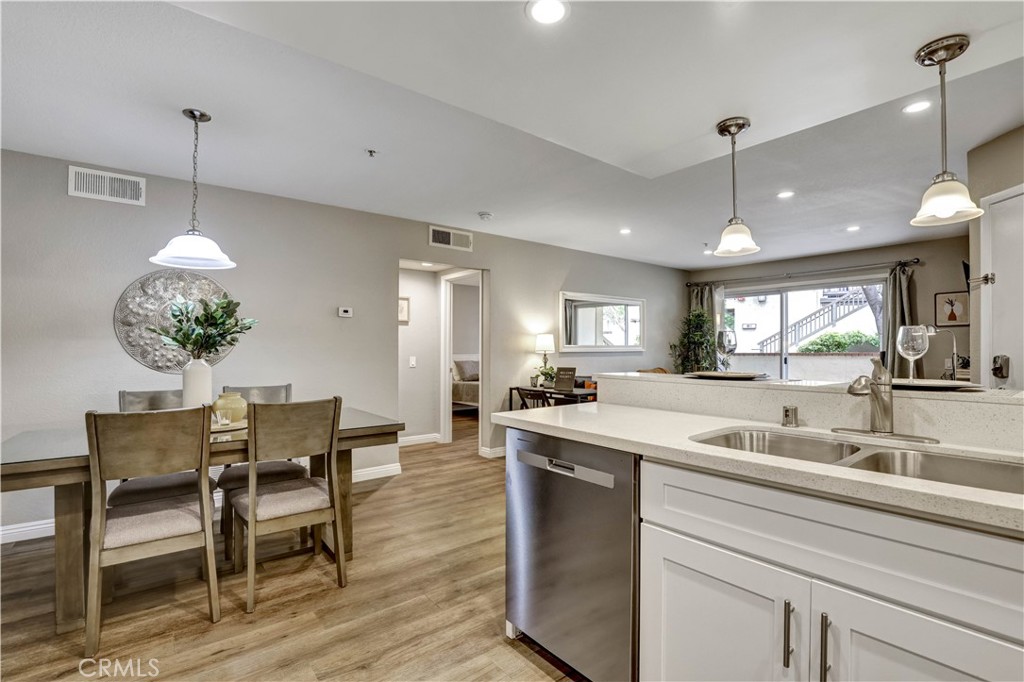 Full Kitchen with Stainless Steel appliances and Kitchenware - 129 N Cross Creek, Orange CA 92869 - photo 11