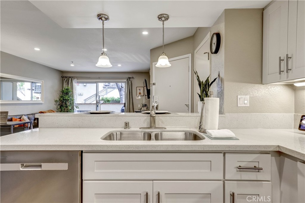 Full Kitchen with Stainless Steel appliances and Kitchenware - 129 N Cross Creek, Orange CA 92869 - photo 12