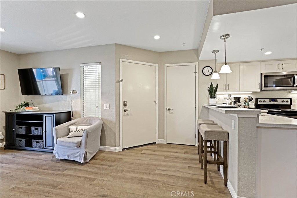 Front Door Entrance in to Living Room/Kitchen Area. - 129 N Cross Creek, Orange CA 92869 - photo 15