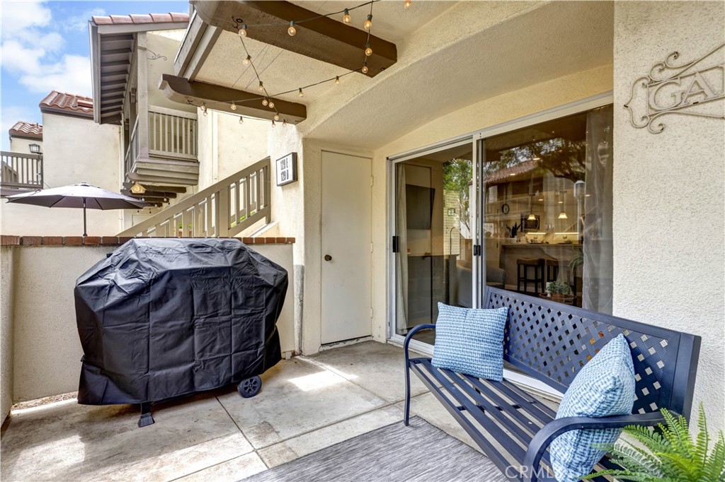Private patio with bench and BBQ. - 129 N Cross Creek, Orange CA 92869 - photo 33