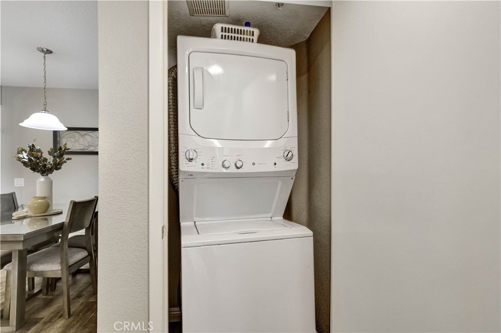 Inside full size washer and dryer in closet. - 129 N Cross Creek, Orange CA 92869 - photo 36