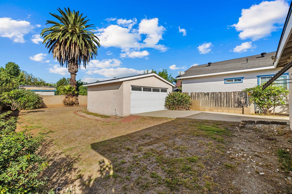 Spacious backyard with detached garage and plenty of room for the next owner to create an outdoor space that fits their - 150 S Park, Orange CA 92869 - photo 5