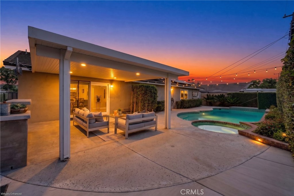Beautiful high-end pool home with backyard made for entertaining. Twilight is virtually enhanced. - 1517 E Riverview, Orange CA 92865 - photo 1