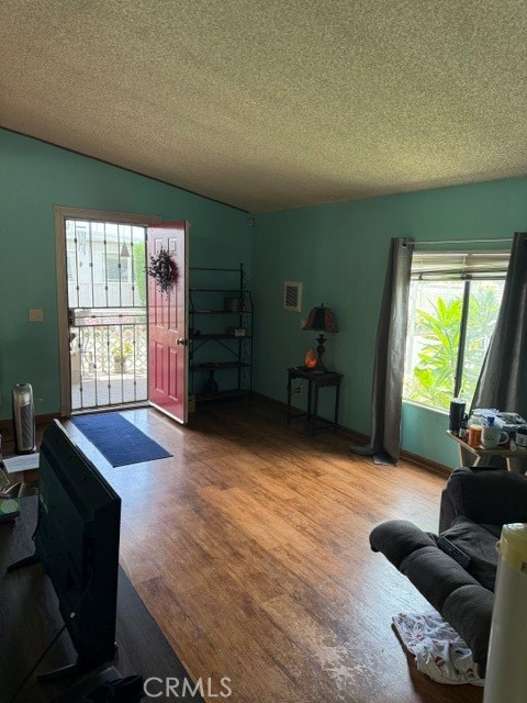SPACIOUS LIVING ROOM W/ VAULTED CEILING - 1540 75 E Trenton, Orange CA 92867 - photo 2