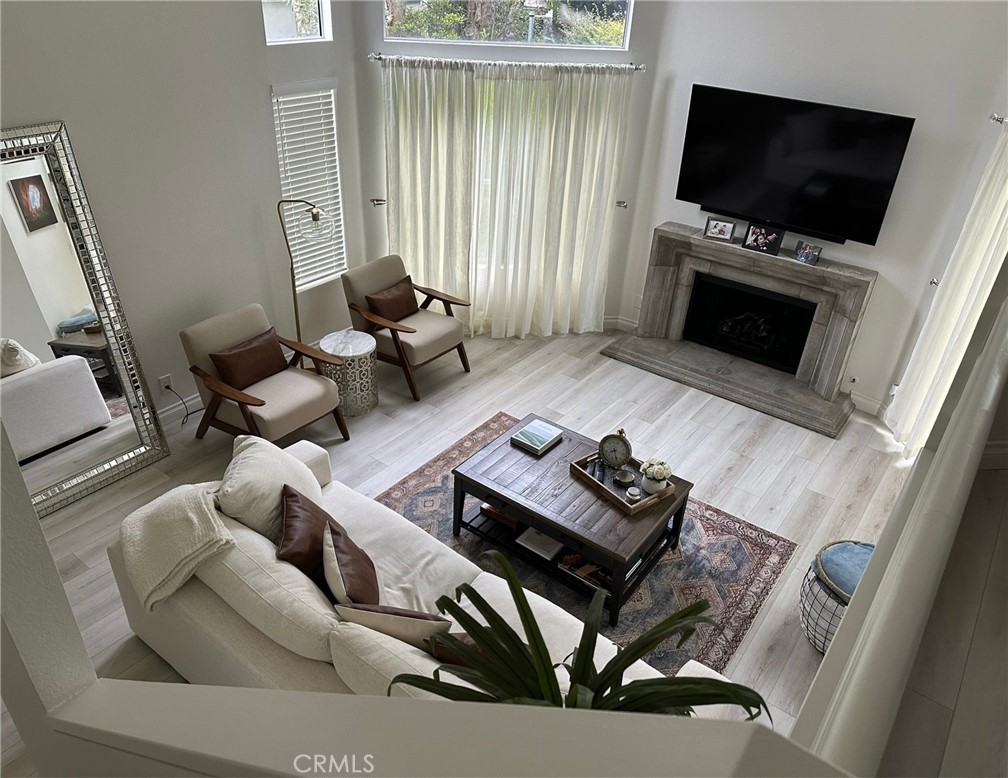 166 N Singingwood 15, Orange CA 92869 - photo 1
